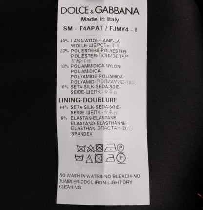 Dolce &amp; Gabbana Elegancka złota spódnica ołówkowa z wysokim stanem i frędzlami